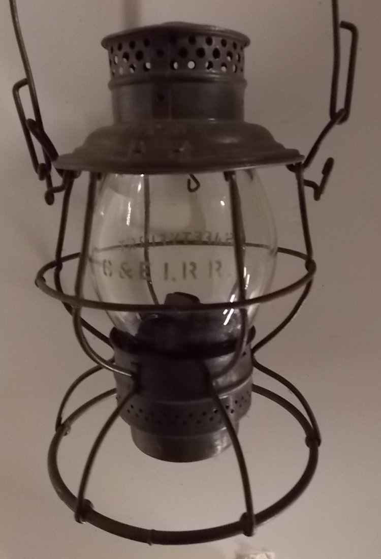 Western Pacific Adlake Lantern C&EI Etched Globe: An interesting mis-match of frame and globe. The frame is a Western Pacific Railway Adlake Reliable. The frame is missing the top spring and some crumpled newspaper is currently used as a spring. The