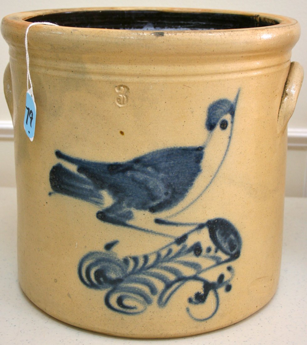 Three Gallon stoneware decorated Crock bird on stump: Wonderful stoneware decorated Crock bird on stump with well defined bird sitting on stump, excellent blue color, one rim chip, small stress line that does not go through, two minor interior stone pops