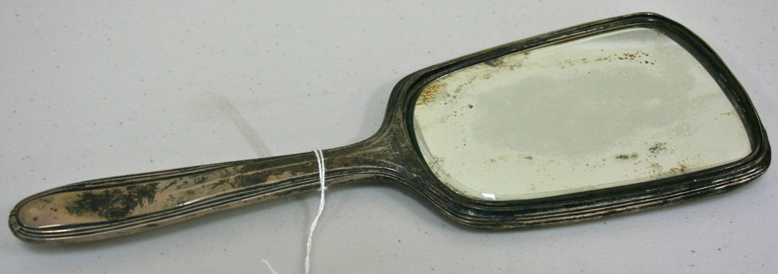 Sterling silver hand mirror: Sterling silver hand mirror, marked "sterling" 12" long, 4.25" wide, handle is damaged