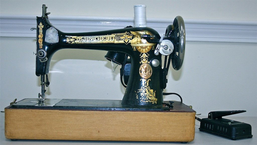 singer Sewing Machine: Singer portable sewing machine, nice stenciling, in case