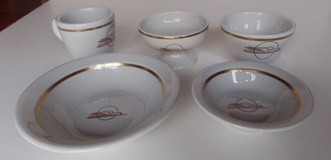 Union Pacific Railroad 5 Pieces Winged Streamliner: This group of Union Pacific Railroad “Winged Streamliner” pattern china all have a gold pin stripe. This group has: (1) Sterling bowl 6 1/4” (2) Sterling bowl 4 1/2” (3) coffee cup by Sterling