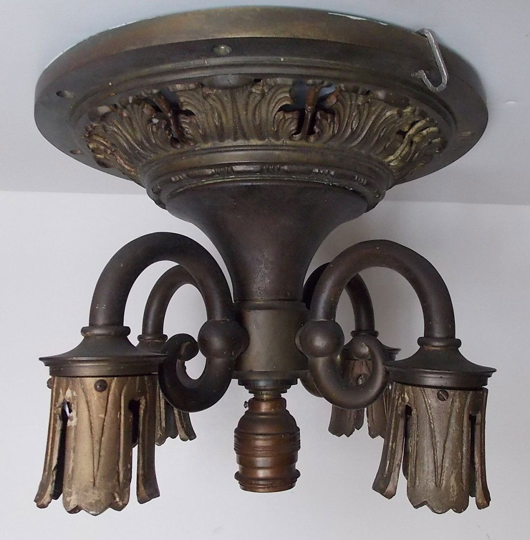 Long Island Railroad Brass Lighting Fixture: A very heavy brass lighting fixture from an old Long Island Railroad coach. The consignor included a photocopy showing this brass lighting fixture in use in 1930. It measures 13” in diameter and it