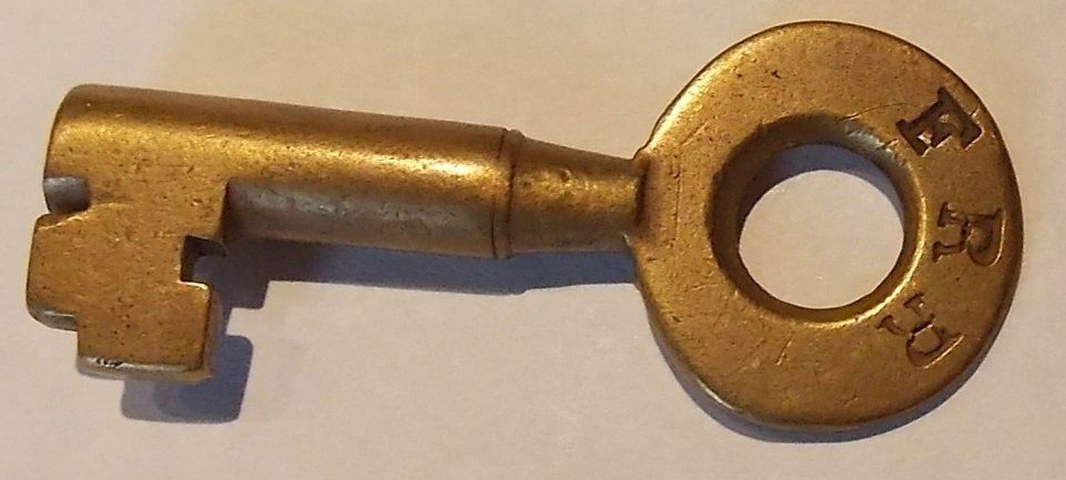 Fitchburg Railroad Tapered Barrel Switch Key: A nice Romer made tapered barrel key for the Fitchburg Railroad. Very nice markings.
