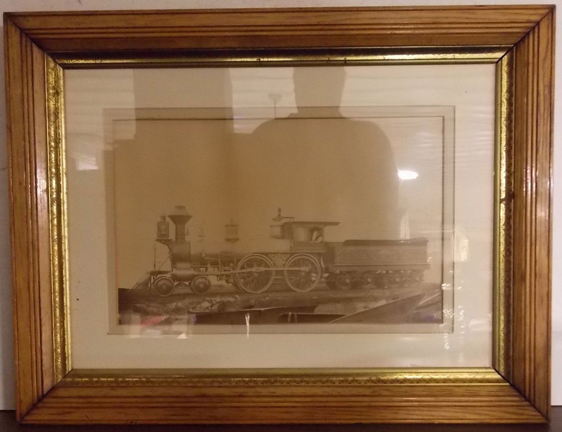 * Framed Builder's Photograph #29 4-4-0: A framed steam locomotive photograph with great age. The outside of the frame measures 28” by 22”. The image size is 17 1/2” by 11”. The locomotive is a 4-4-0 and it has a square headlight, or