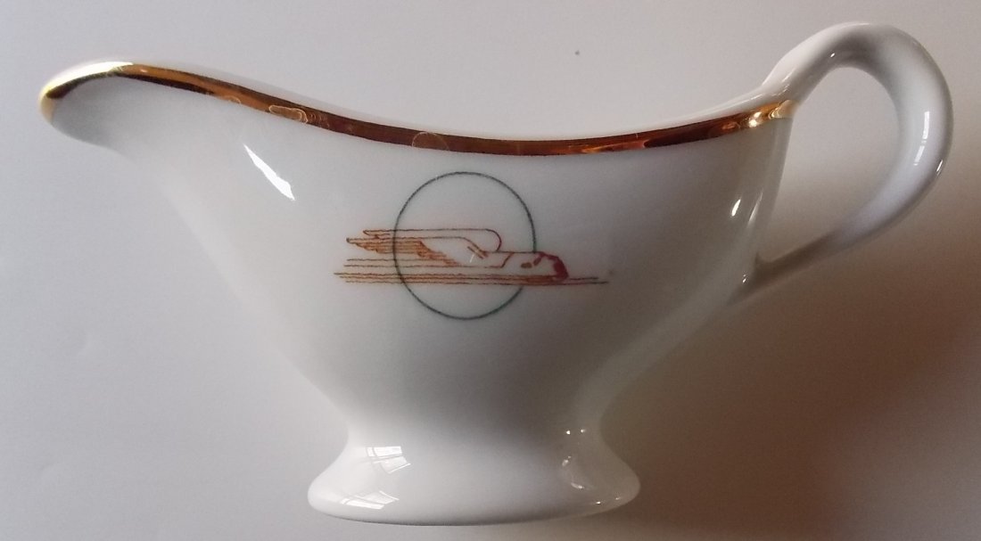 Union Pacific Railroad China Gravy Boat WS: This is the smaller of the two individual use gravy boats made in this pattern. We have the other size too! This gravy measures 6 1/2” long and it stands 3” tall. It was made by Sterling China. Sh