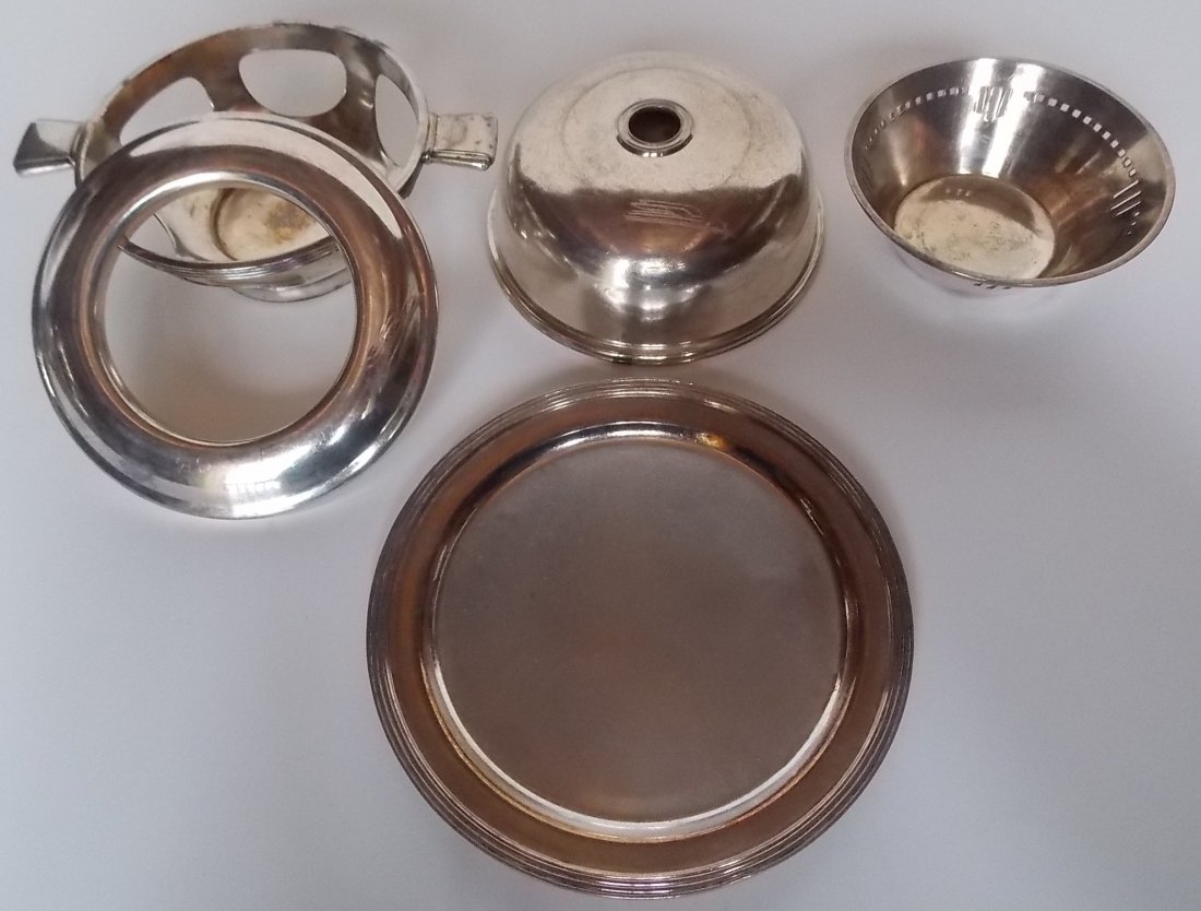 Union Pacific Railroad Dining Car Silver 5 Pieces: A group of Union Pacific dining car silverplate. 5 pieces include 2 parts of a “Supreme” set (collar and base). A food cover with the Winged Streamliner logo on the side/top. This cover is just 5