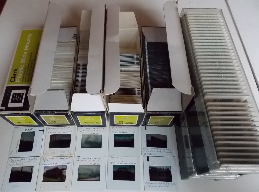 Storage Boxes and Trays 550+- Slides Mixed Boxes: A group of boxes and trays that come to about 550 slides. The group includes: about 100 New Haven reprints, 70 Japan trip including steam, 80 commercial prints, about 100 Cass Scenic, about 100 mixed 