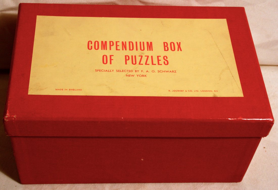 Compendium Box of Puzzles: Box of puzzles, made in England FAO Schwarz 11 puzzles, like new, wear on box corners
