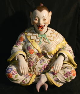 Rare Meissen Buddah, Female: Rare Meissen Female Buddah, nodding, fancy floral dress, (hands, head & tongue move), marked on bottom of weights, inside of neck, base. Originally used to detect earthquake tremors. 13" high X 13.5"