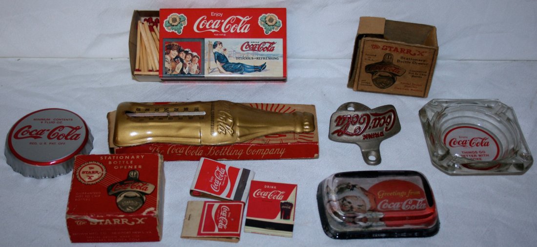 Coca Cola Advertising: Large Tray Lot of Coca Cola Advertising including: thermometer, paper weight, ash tray, bottle openers, etc
