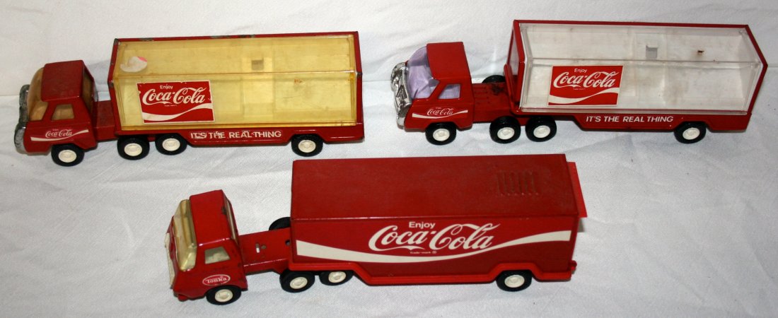 Coca Cola Advertising Lot: Coca Cola Advertising Lot to include: toy trucks, mostly Buddy L, etc