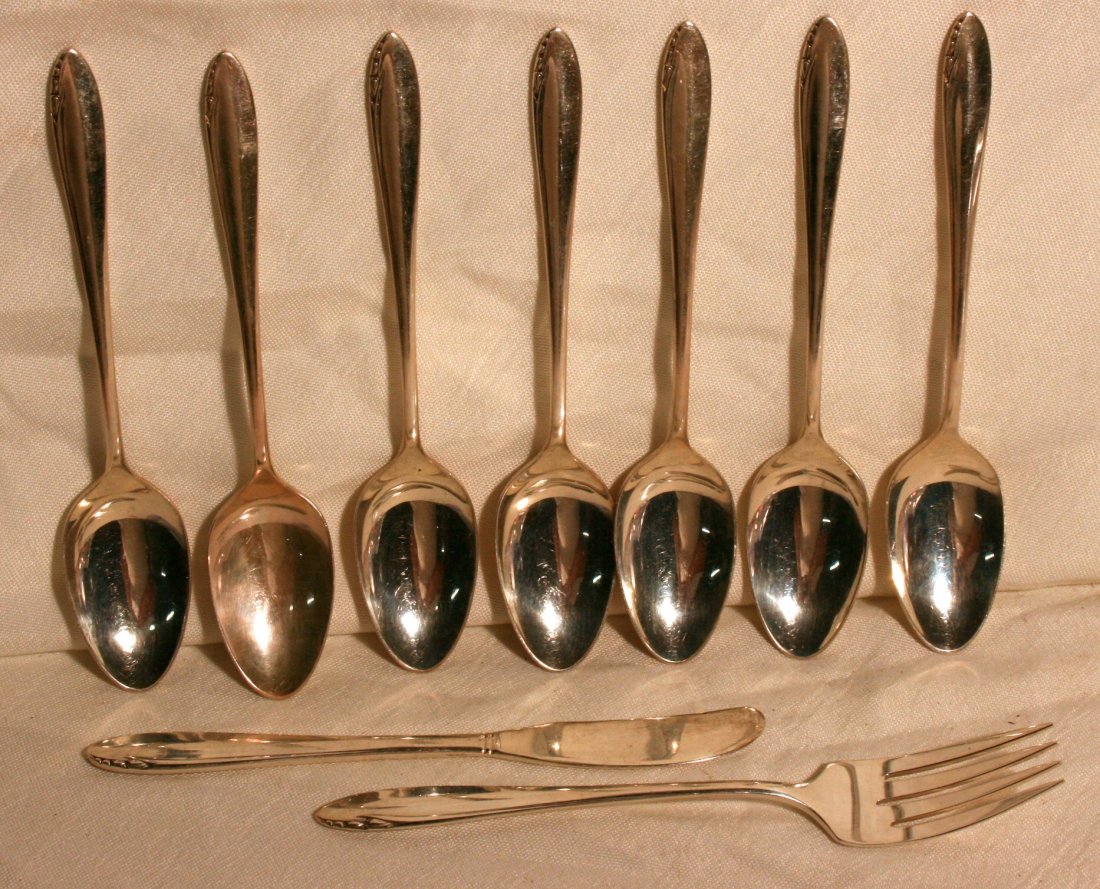 Sterling Spoons: "Heirloom Sterling" " Lasting Spring" 7 Spoons, 1 Fork, and 1 Butter knife. Approx. 9.1 toz