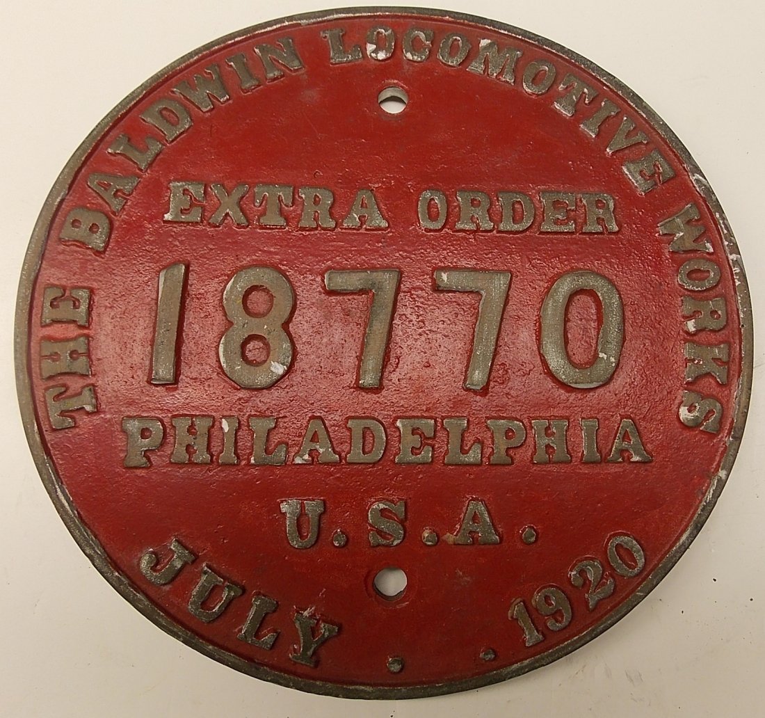 Baldwin Locomotive Builder's Plate Extra 18770: A 9 1/8" diameter Baldwin steam locomotive builder's plate. It is Extra Order 18770. This is from the same 2-6-0 Smokey Mountain Locomotive from the previous Baldwin plate in this auction. I will try 