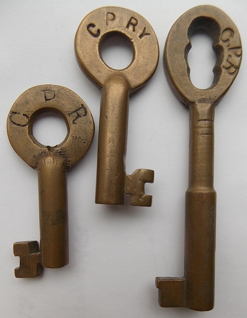 3 Canadian Pacific Brass Keys: This group of keys is: (1) CPR (2) CPRY with older Adams & Westlake oval logo on the reverse (3) CPR coah or caboose style key.