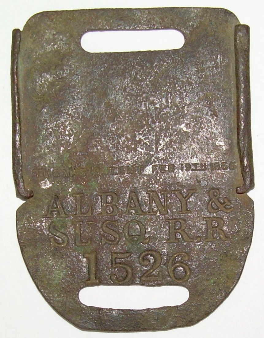 Albany & Susquehanna early Baggage Tag: An early Thomas patent Albany & Susquehanna Railroad brass baggage tag with a number of 1526. This tag pre-dates the Delaware & Hudson Railroad takeover of this line. It shows pitting and could be cle
