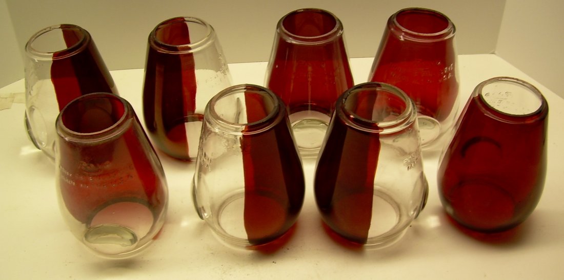 8 Rayo Pont Bullseye Globes with Red Flashing: A group of 8 Rayo Pony globes. All have red flashing on 1/2 and a bullseye. They measure 2 1/4" top diameter, 2 7/8" base diameter, 5" visible - not counting top and bottom flanges. All 8 are in good 