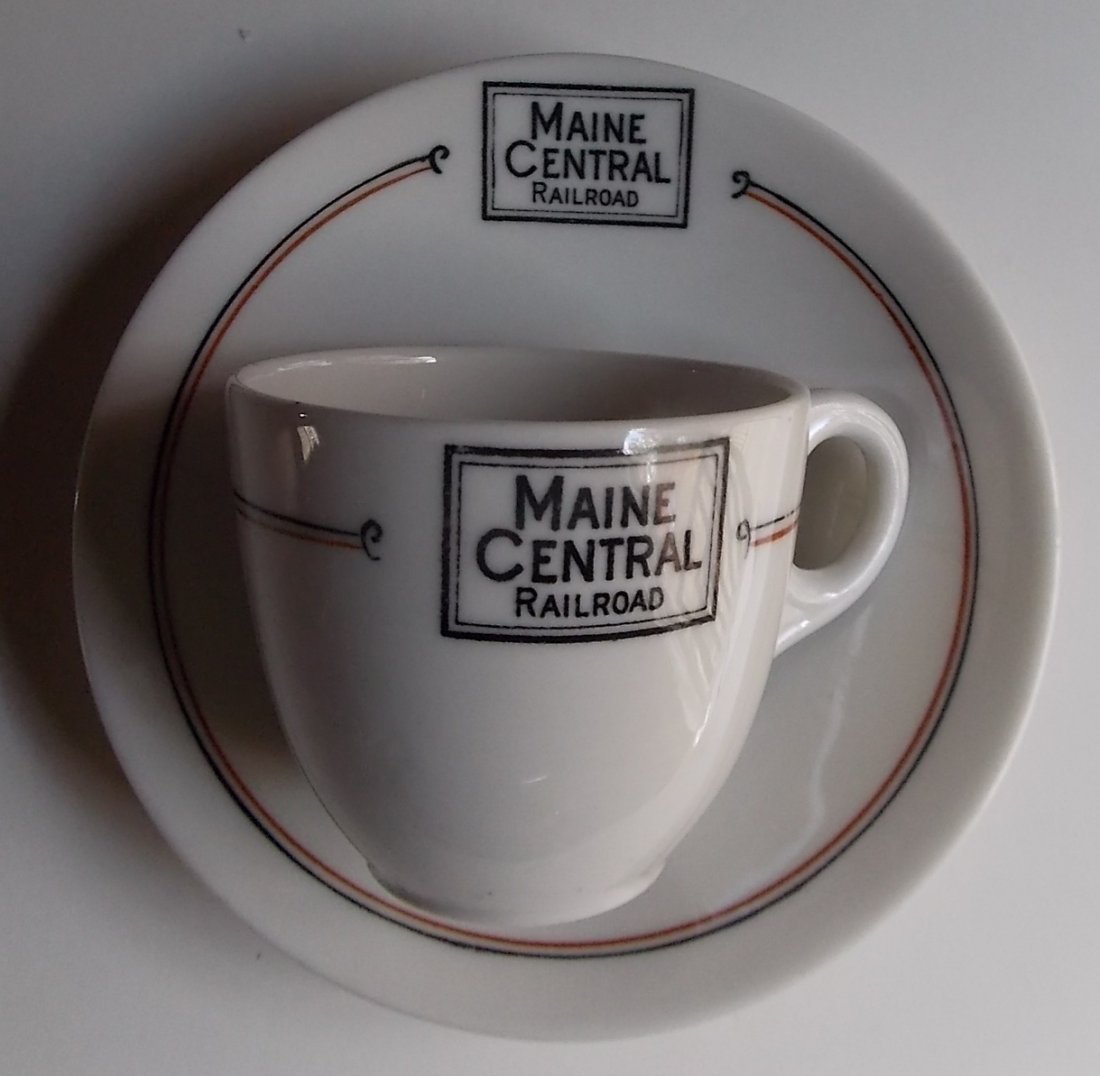 Maine Central "Bangor" Pattern Demi Set: Well, I have never seen this piece in the Bangor pattern. It's a matched demitasse coffee set. The cup and saucer have the fine Maine Central "Bangor" box logo. Both pieces have an M/L China backstamp