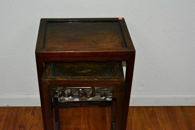 Rosewood nesting tables 2 piece set: Rosewood nesting tables with carved designs