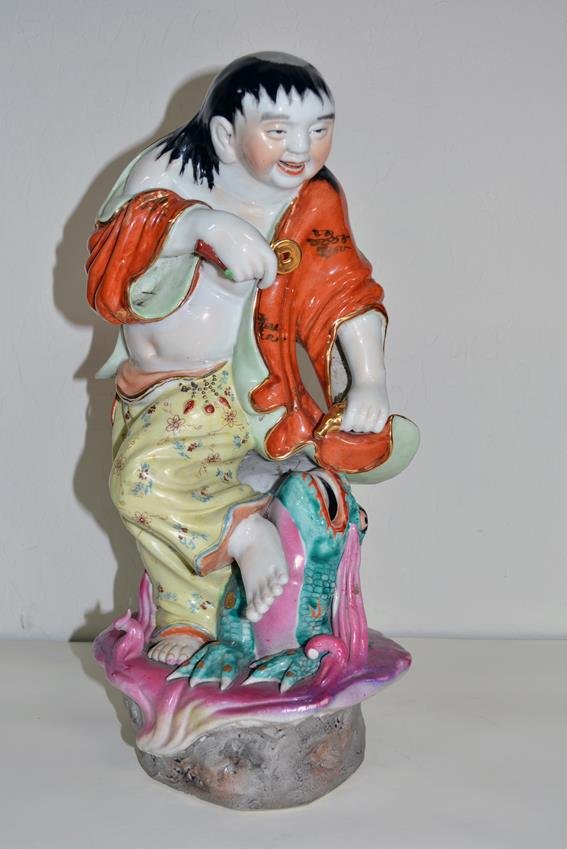 Lui Hai, fairy boy statue: Liu Hair, a fairy boy wearing his hair in bangs, resting foot on toad, holding a gold coin. He is good luck, brings prosperity.17 in H.