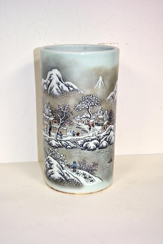 Chinese porcelain brush holder: Porcelain brush holder with images of snow capped mountains and chinese calligraphy on the back. Stamp on bottom.9H x 5W.