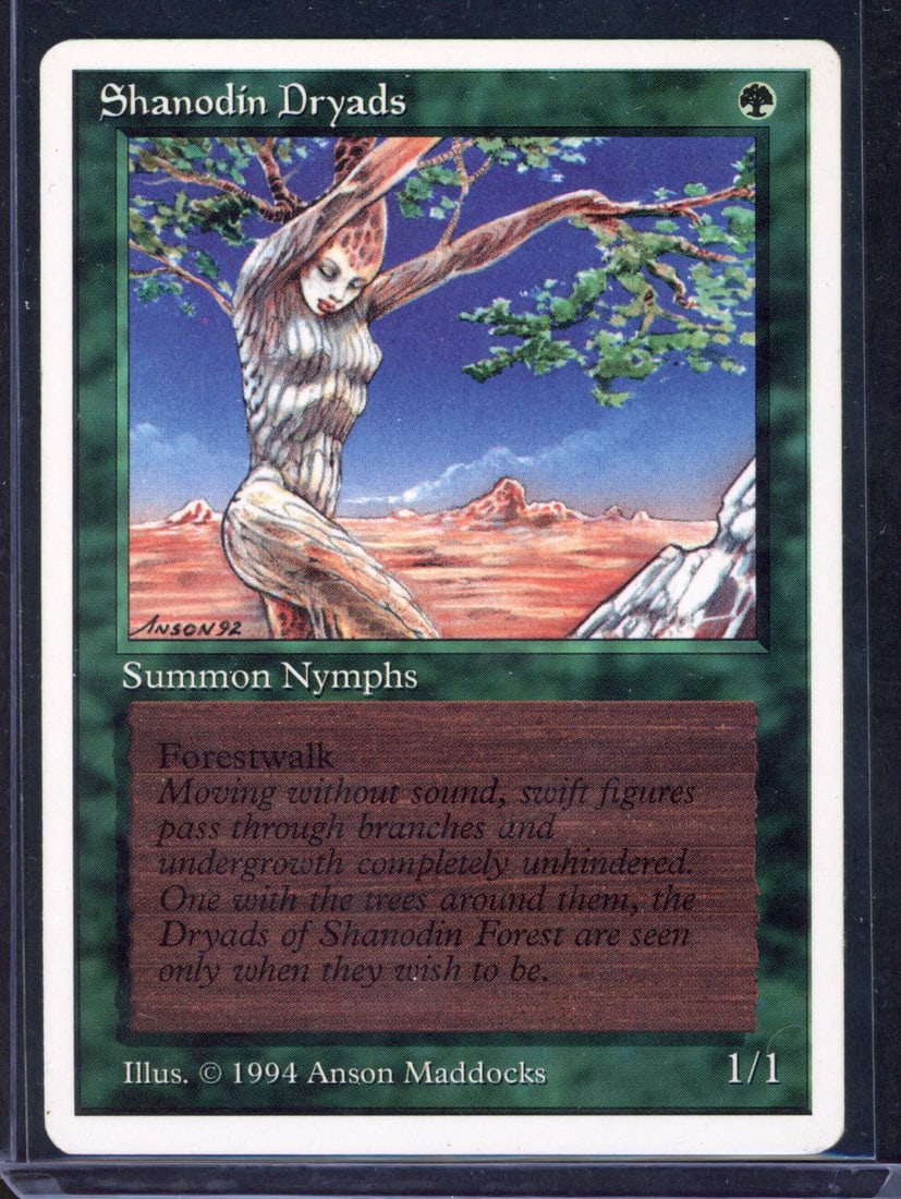 Magic The Gathering - Summer Magic Shanodin Dryads - Light Play: This lot features the fabled Summer Magic, Shanodin Dryads in Light Play condition. The card has a very clean front but very minimal edgewear that's visible on the back right hand side of the card - p