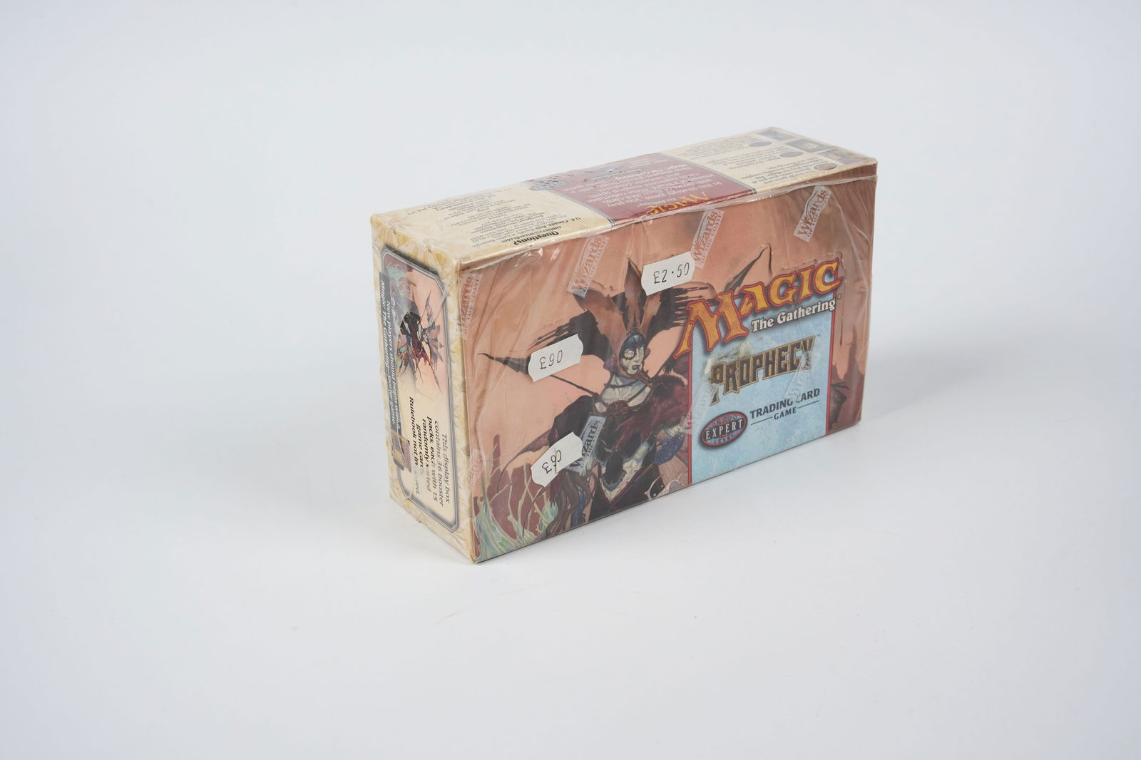 Prophecy Factory Sealed Booster Box: A factory sealed booster box of Prophecy with original plastic wrap in great condition, featuring 36 booster packs.Please note that this product has some of its original price stickers on the box.This