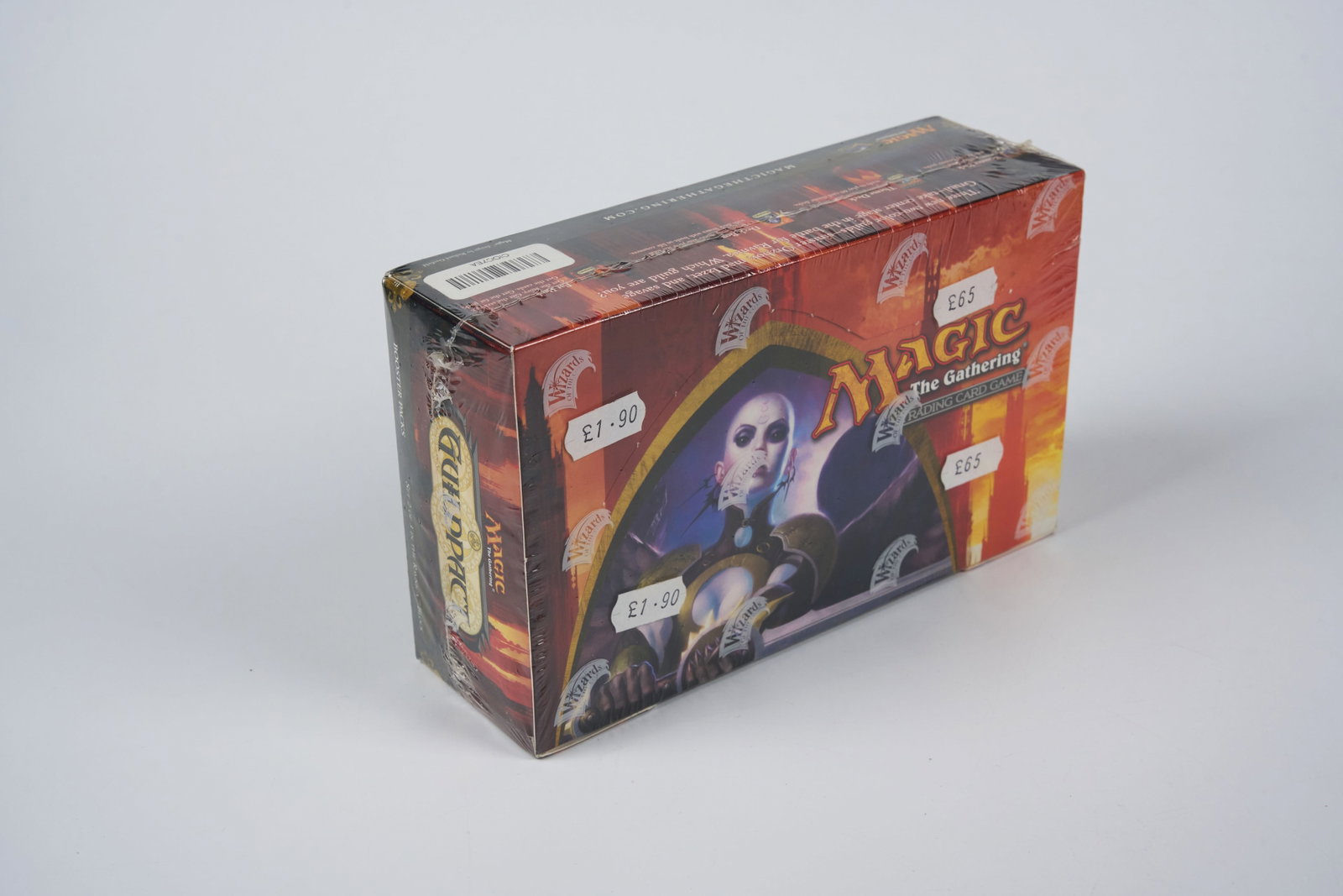 Guildpact Factory Sealed Booster Box: A factory sealed booster box of Guildpact in fantastic condition, featuring 36 booster packs.Please note that this product has some of its original price stickers on the box.This box comes from the va