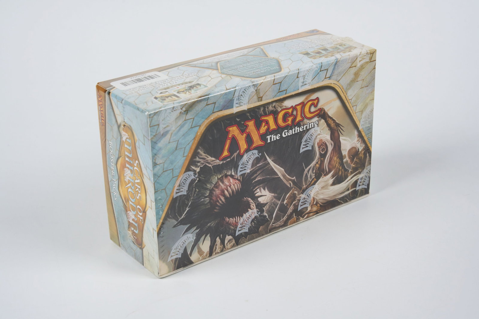 Scars of Mirrodin Factory Sealed Booster Box: A factory sealed booster box of Scars of Mirrodin in fantastic condition, featuring 36 booster packs.Please note that this product has some of its original price stickers on the box.This box comes fro