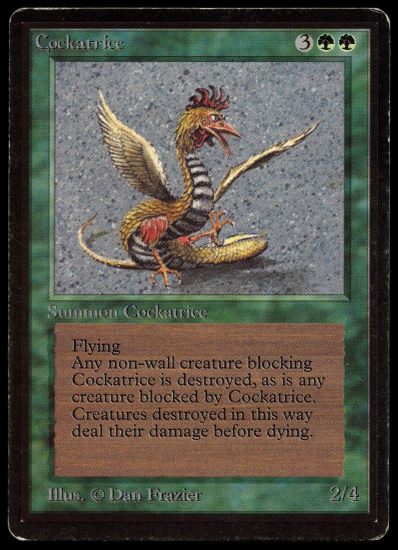 Cockatrice - Beta (LP): Cockatrice from Beta in Light Play (LP) condition. In addition to border wear on each side, the top right corner is worn and is lightly frayed as a result. The card surface in decent condition with a