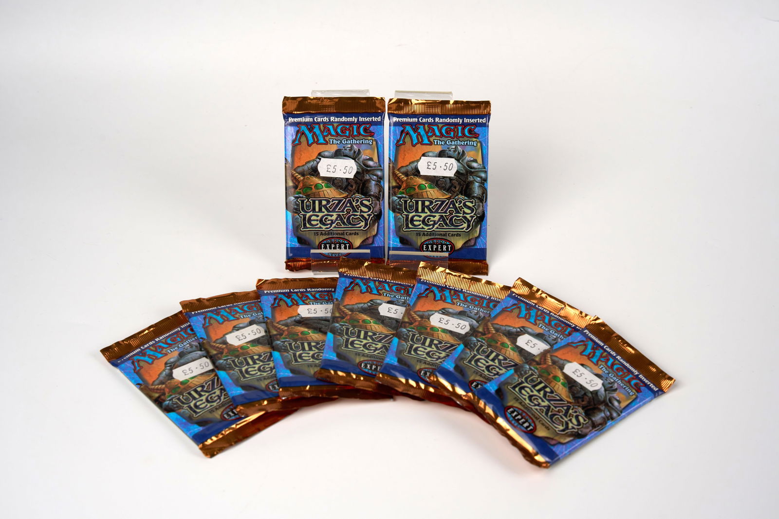 X9 Urza's Legacy Booster Packs: This lot features x9 sealed booster packs of the Urza's Legacy expansion. Many of these packs have the original price stickers on them, however the condition is very good.These boosters came from a Ga