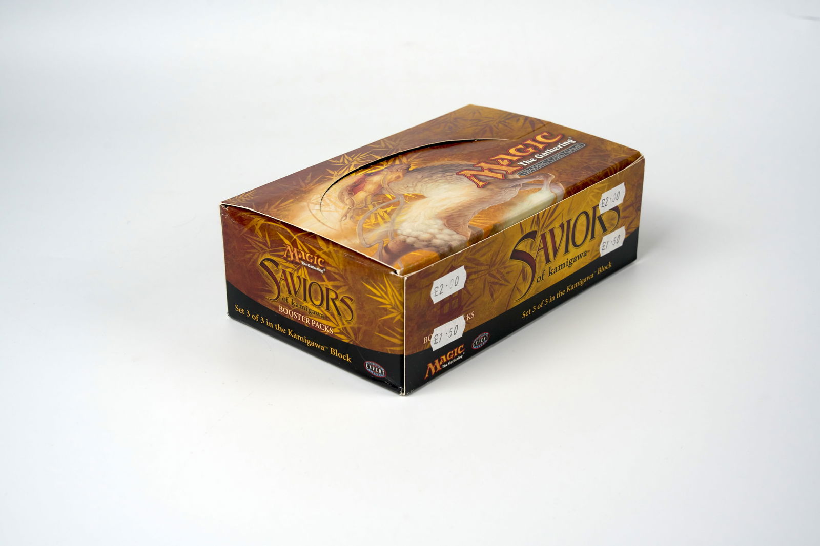 X32 Saviors of Kamigawa Booster Packs: This lot features x32 sealed booster packs form the Saviors of Kamigawa expansion. These booster are in as new condition. Many of the packs still have their original price stickers. Also included is t