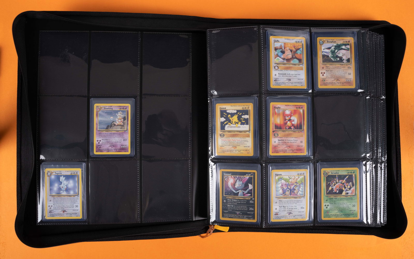 Neo Genesis // Neo Discovery // Neo Revelation // Neo Destiny - Partially Complete Sets: This exciting lot features partially completed sets of the four expansions in the Neo Series: Neo Genesis, Neo Discovery, Neo Revelation, and Neo Destiny (2000-2002). These sets were put together by a