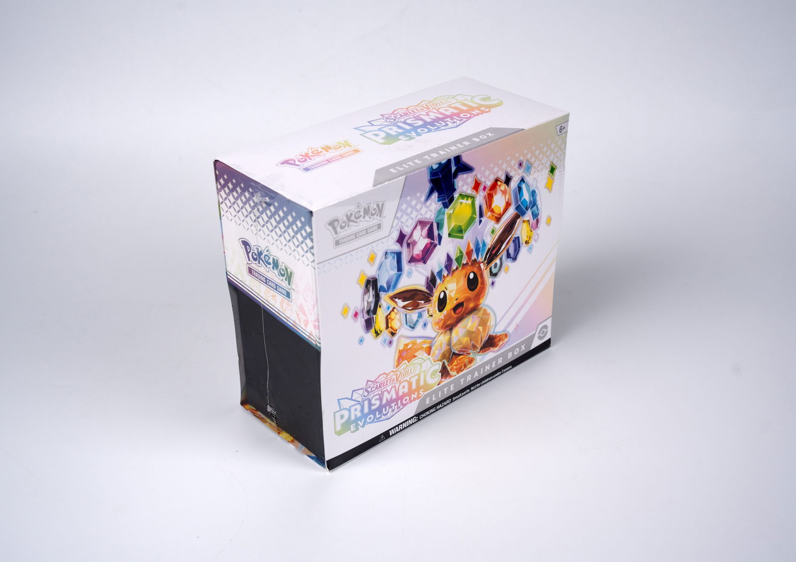 Prismatic Evolutions Elite Trainer Box: A sealed Prismatic Evolutions Elite Trainer Box in as new condition. The official contents for the product is as follows:The Pokémon TCG: Scarlet & Violet—Prismatic Evolutions Elite Trainer Box inc