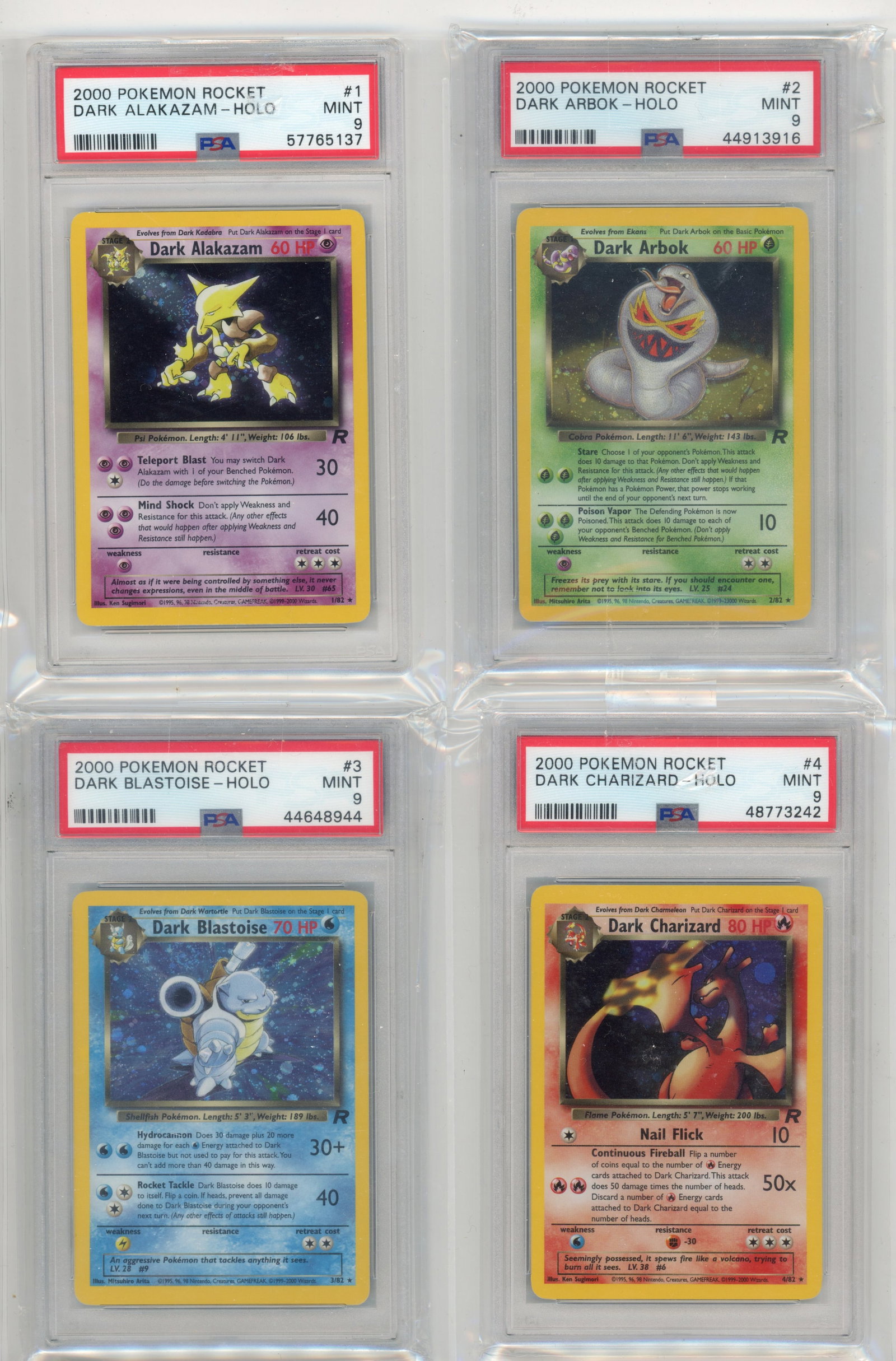 PSA 9 Team Rocket Complete Holo Set (X18 Graded Cards): This incredible lot features all x18 of the original Team Rocket holos, each graded by PSA and scoring a MINT 9.This includes: Dark Alakazam #1, Dark Arbok #2, Dark Blastoise #3, Dark Charizard #4,