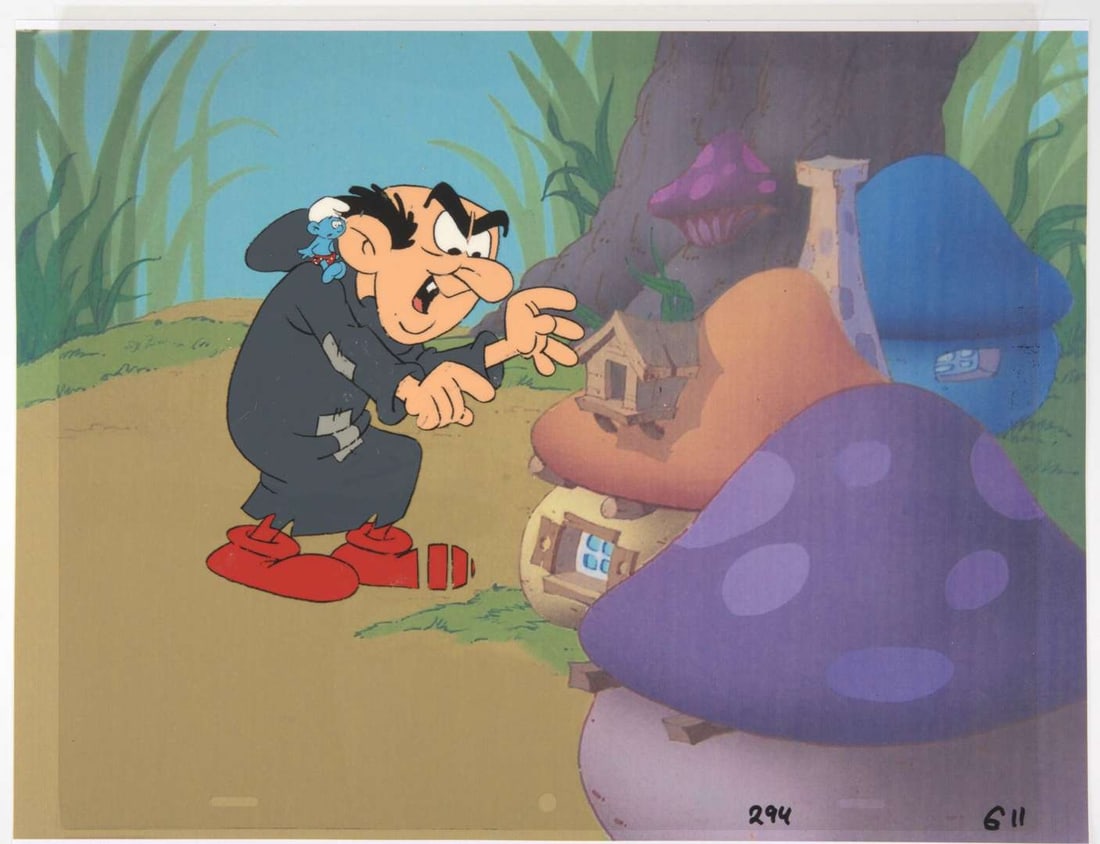 The Smurfs Original Baby Smurf And Gargamel Production Cel (Hanna Barbera, 1981-1989) Total 2: The Smurfs Original Hand Painted Production Cel (Hanna Barbera, 1981-1989) Total 2.Original animation cel of Baby Smurf and an Elephant, and a animation cel of Gargamel and Smurf, with printed backgro