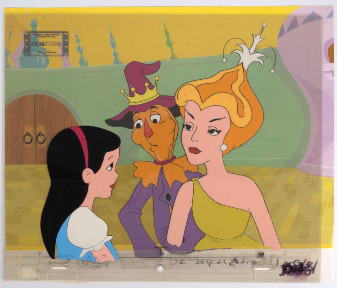 Journey Back To Oz Original Dorothy, Scarecrow and Glinda Production Cel (Filmation, 1972) Total 2: Journey Back To Oz Multi Layered Original Hand Painted Production Cels (Filmation, 1972) Total 2.Original five layer animation cel of Dorothy, Scarecrow and Glinda the Good Witch. With a printed backg