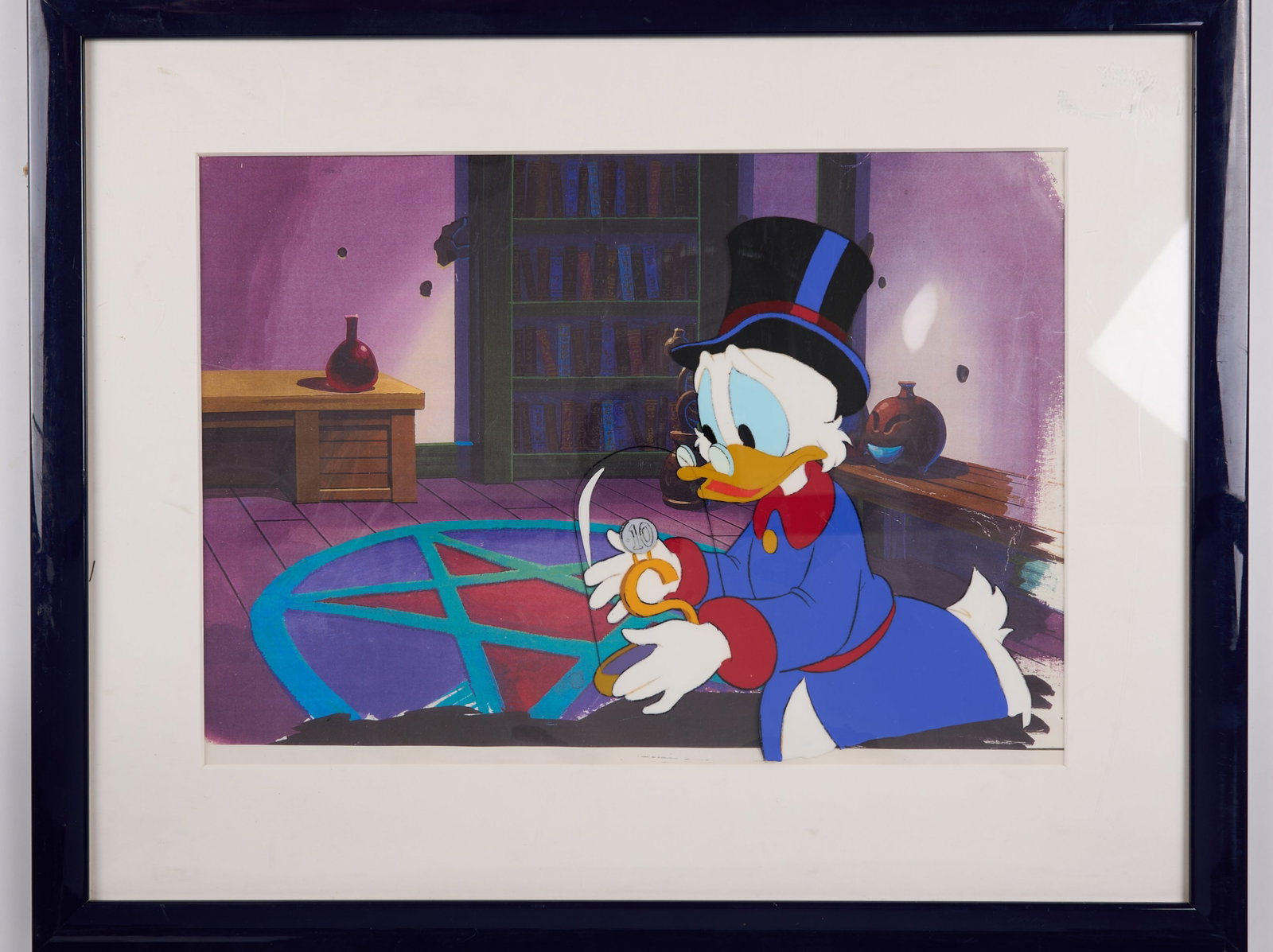 DuckTales Scrooge McDuck Framed Production Cel and Printed Background (Walt Disney, 1987): DuckTales Scrooge McDuck Framed Production Cel and Printed Background (Walt Disney, 1987).Original production cel of Uncle Scrooge from the Disney cartoon series DuckTales. Holding a priced 10c coin w