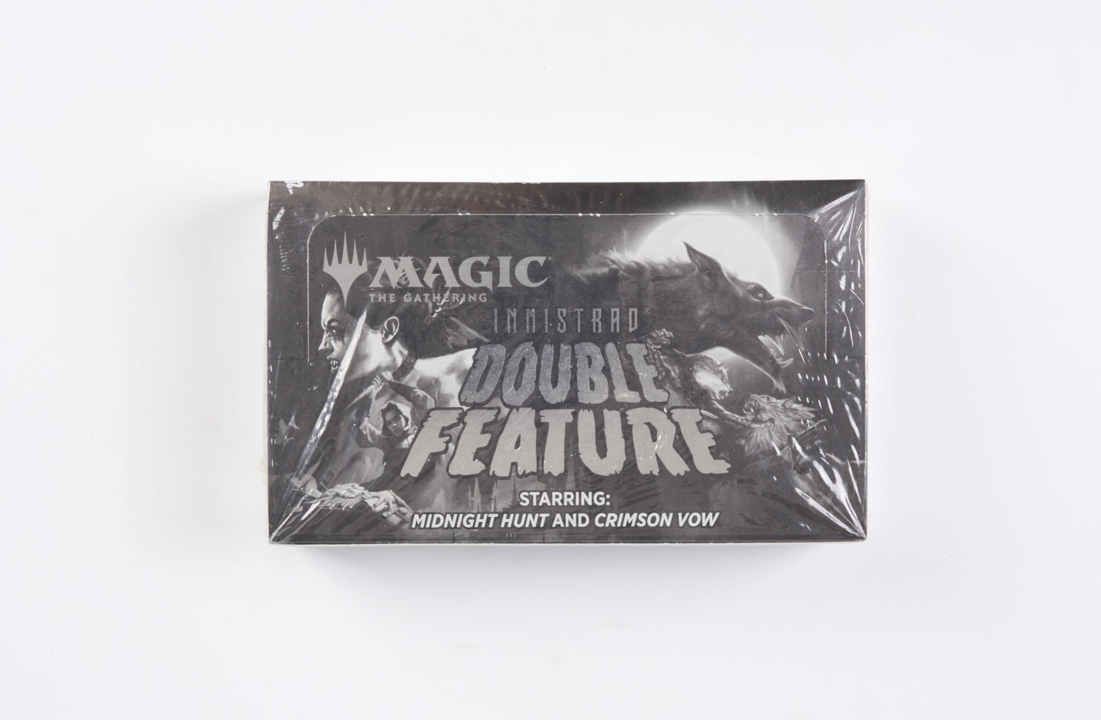 Innistrad Double Feature Draft Booster Box: An Innistrad Double Feature Draft Booster Box, in factory sealed condition.
