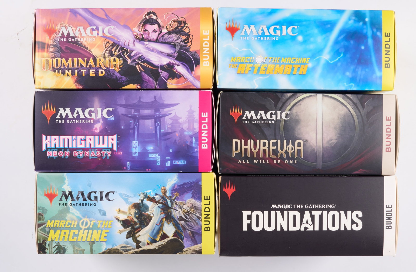 X10 Modern Magic: The Gathering Bundles: This lot features x10 factory sealed Bundles from recent in-universe Magic: The Gathering Sets. It includes:X2 Kamigawa Neon Dynasty, Wilds of Eldraine, Murders at Karlov Manor, The Brothers' War,