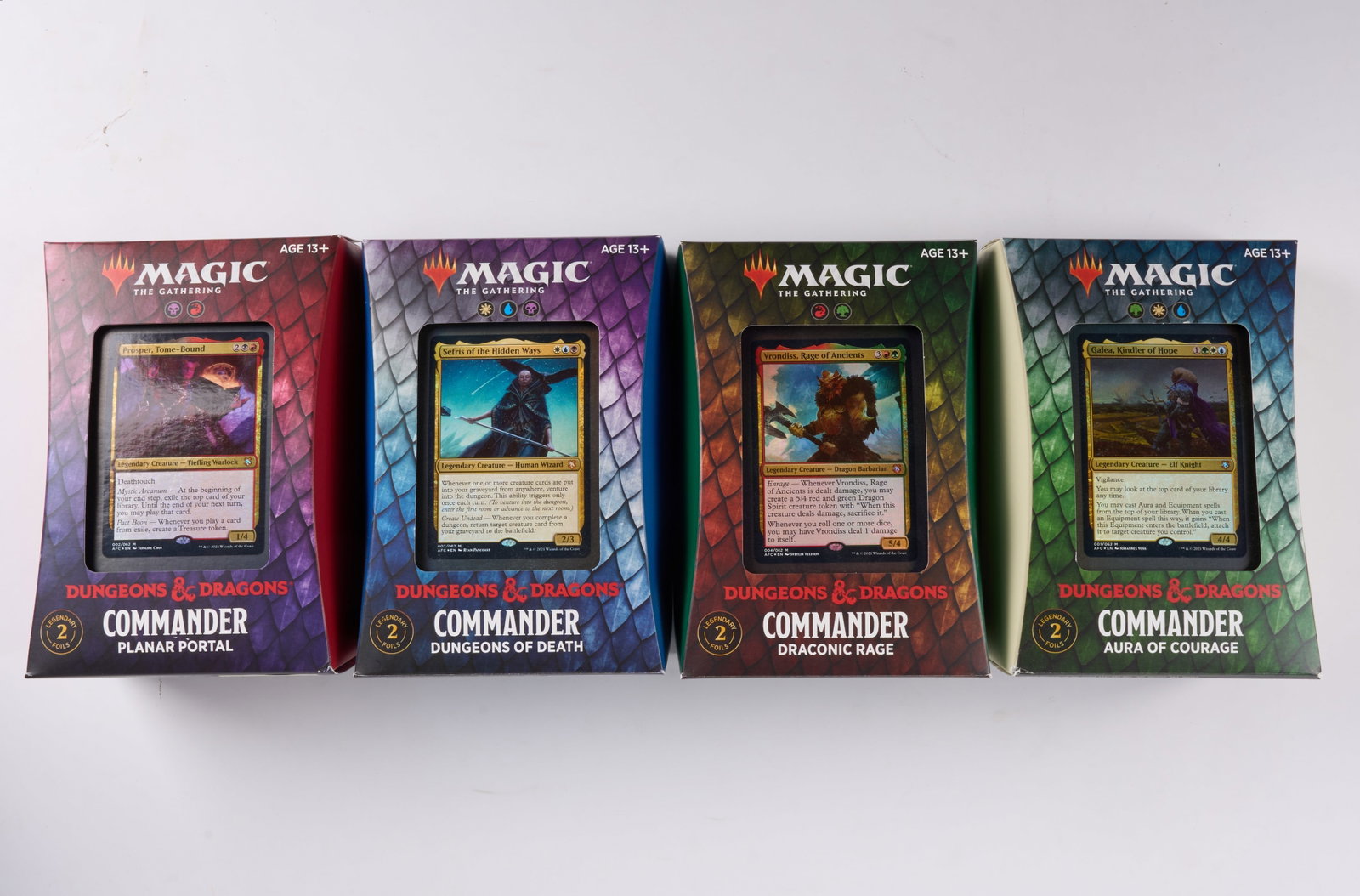 Dungeons & Dragons Commander Deck Bundle (X4 Decks): This lot features x4 of the Dungeons & Dragons Commander Decks in sealed condition. Includes:Planar Portal, Dungeons of Death, Draconic Rage, and Aura of Courage.
