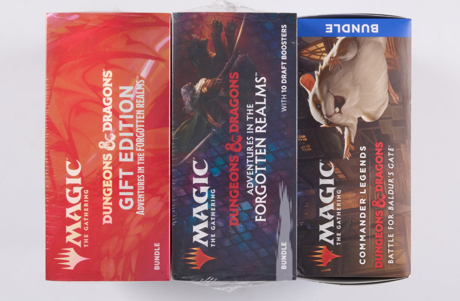 Dungeons & Dragons Bundle Collection: This lot features x3 factory sealed bundles from the Magic: The Gathering Dungeons & Dragons sets, including:Adventures in the Forgotten Realms Bundle, Battle for Baldur's Gate Bundle, and an