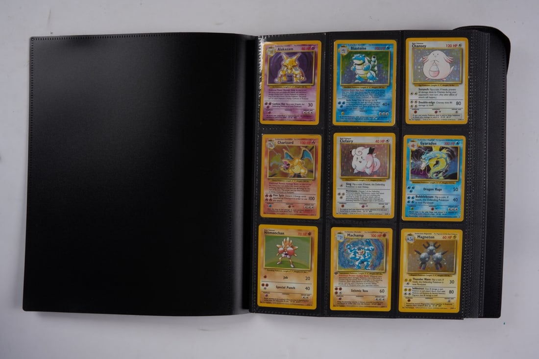 Base Set Complete Set - 102/102: A complete Unlimited printing of Base Set (1999), in a range of conditions. Of all x16 holos, the highlights and their respective conditions are:Charizard #4 HP – the card shows signs of scratches,