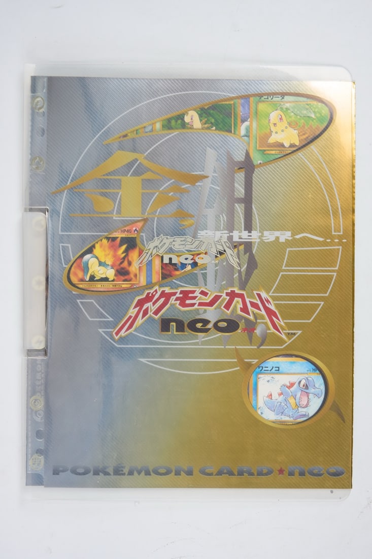 Neo Genesis Premium File 1 - Opened: The Neo Genesis Premium File 1, opened but with unused cards. Features the Typhlosion, Meganium, and Feraligatr exclusive holos and their respective evolution lines. Some light curling on the shiny