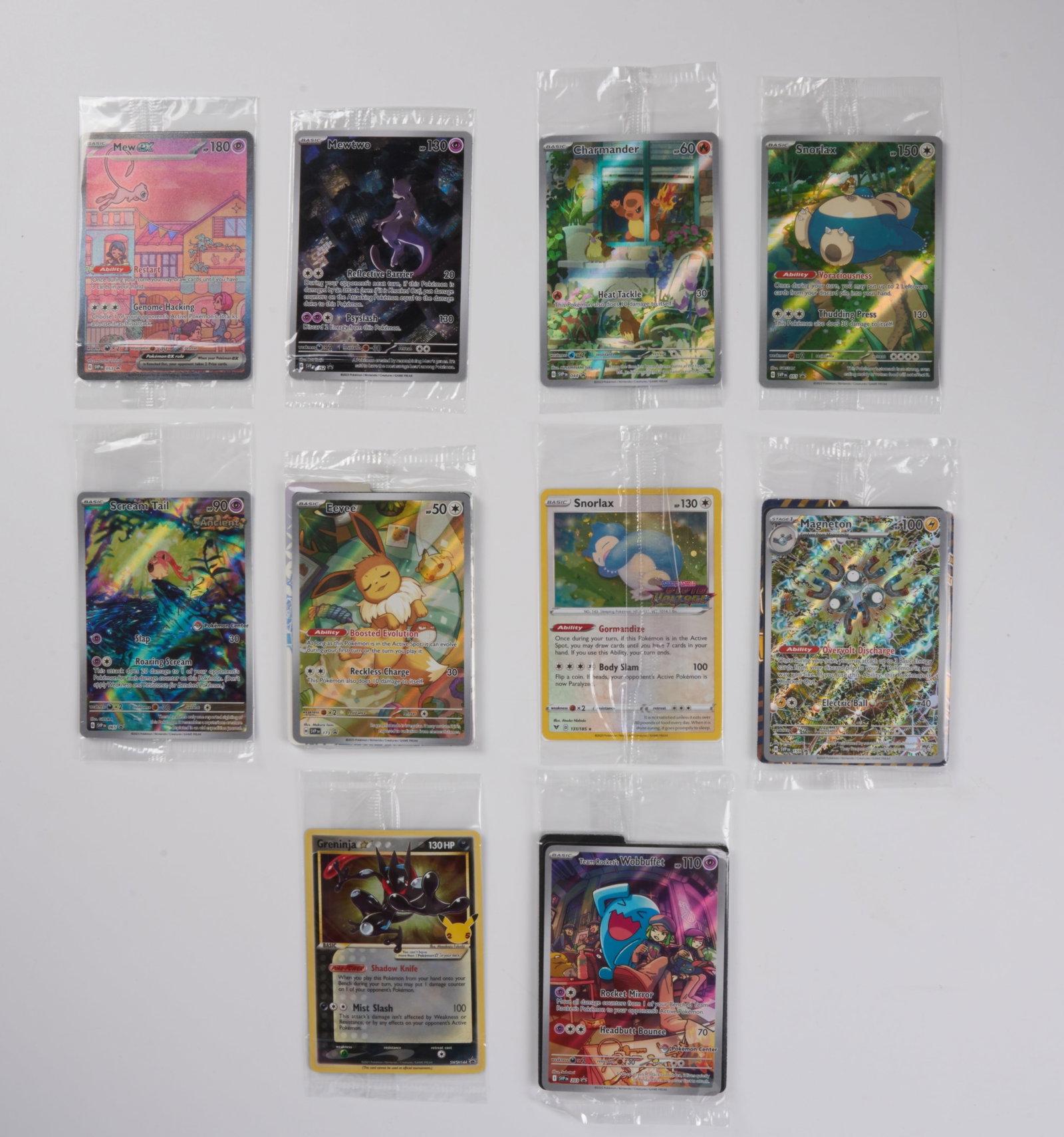 X10 Promo Factory Sealed Bundle: This lot features x10 plastic wrap factory sealed promos from a variety of sets, including:Mew ex #53 - SVPMewtwo #52 - SVPCharmander #44 - SVPSnorlax #51 - SVPGreninja Gold Star #SWSH114 Promo -