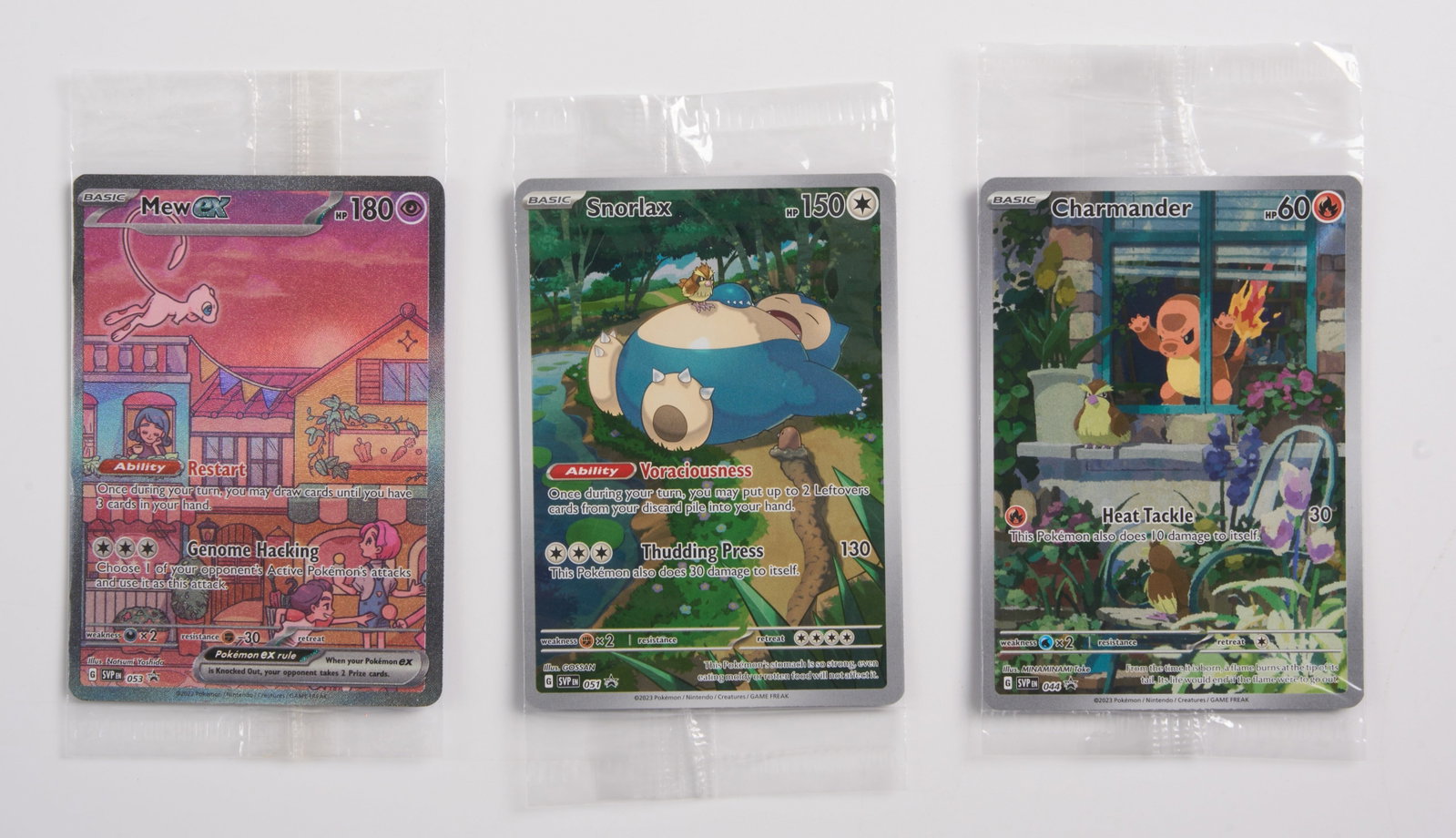 Mew ex #53 // Snorlax #51 // Charmander #44 Scarlet & Violet Promos - Factory Sealed: Mew ex #53, Snorlax #51, and Charmander #44 Scarlet & Violet Promos, all factory sealed in their original plastic wrapping. All seals remain in tact. Slight wear may be present on the cards within.