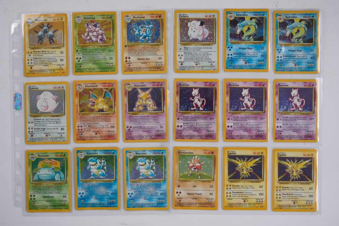Base Set Collection Inc. x21 Holos: A collection of mostly holo cards from the Unlimited printing of Base Set (1999). These cards are in a range of conditions, however the Charizard and Venusaur are in Light Play or better, making this 
