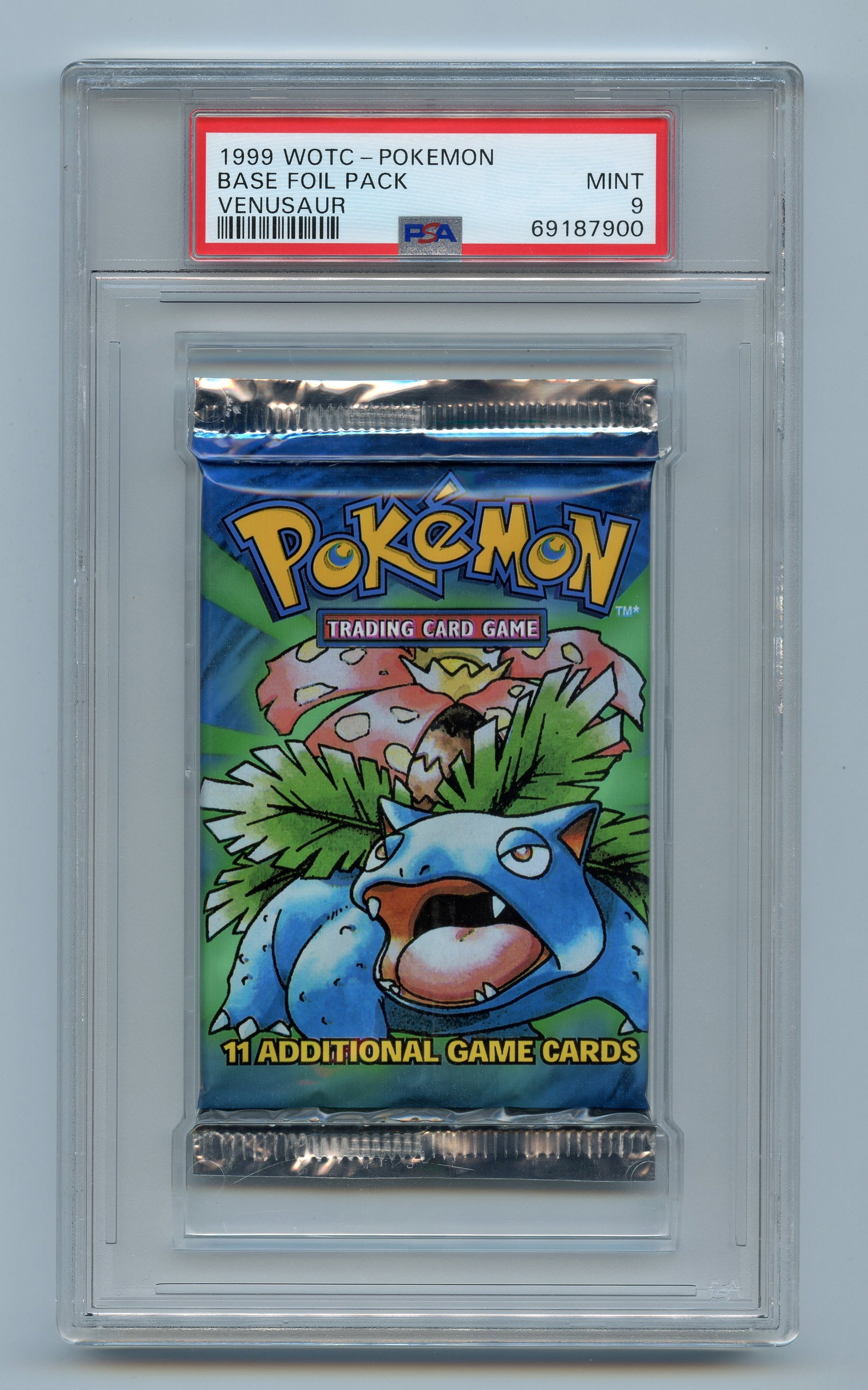 PSA 9 Base Set Booster Pack - Venusaur Artwork: A PSA MINT 9 graded booster pack from the original Base Set, released in 1999.This is a beautiful example of an iconic booster many of us remember opening almost thirty years ago, expertly preserved i