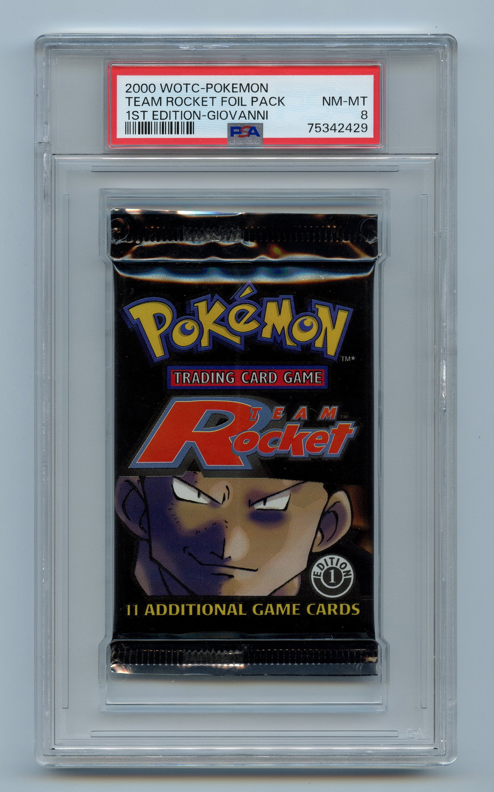 PSA 8 Team Rocket 1st Edition Booster Pack - Giovanni Artwork: A NM-MT 8 graded booster pack from the 1st Edition printing of Team Rocket, released in 2000.This stunning example looks factory fresh, and features the Giovanni artwork and the coveted 1st Edition st