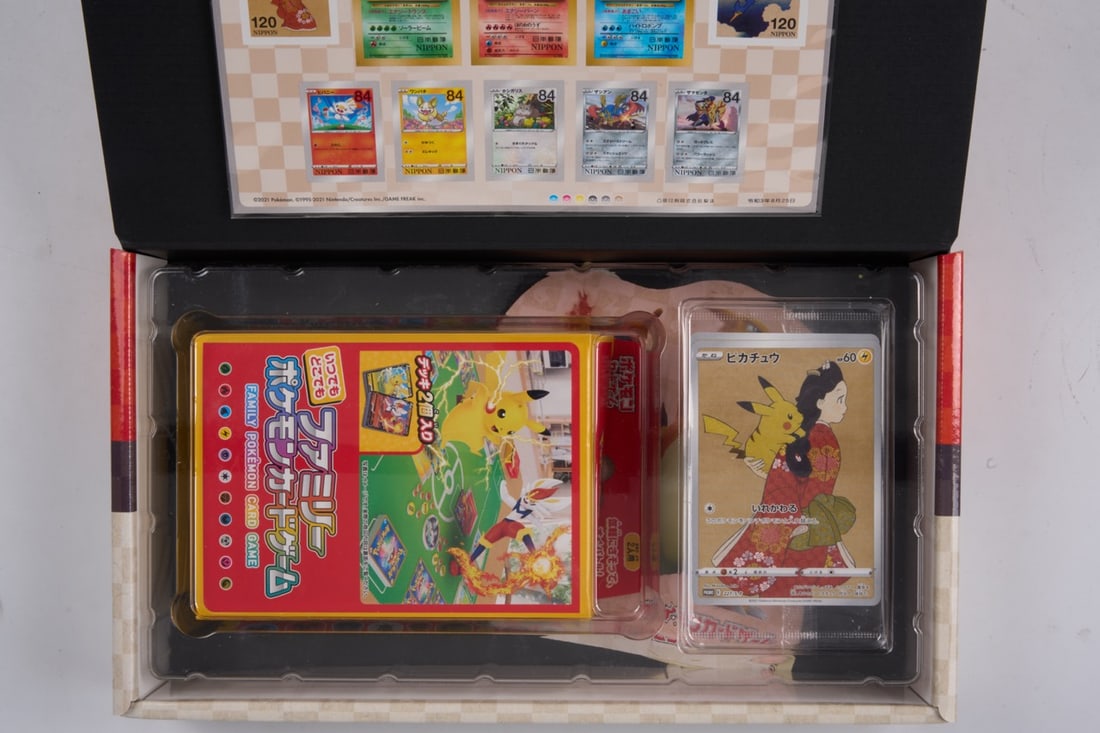 Japanese Stamp Box - Inc. Original Sealed Promos Pikachu 227/S-P & Cramorant 226/S-P: A stunning Japanese Stamp Box set, with original decks (sealed), and the two extremely coveted exclusive promos: Pikachu 227/S-P & Cramorant 226/S-P. The box has been opened, but the contents inside a
