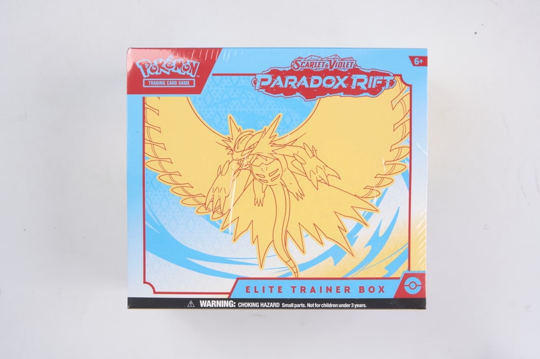 Paradox Rift Elite Trainer Box - Sealed: This lot contains a factory sealed Paradox Rift ETB from the Scarlet & Violet. The product comes with booster packs and a promoThis item is perfectly sealed with no tears in the wrapping and in overal